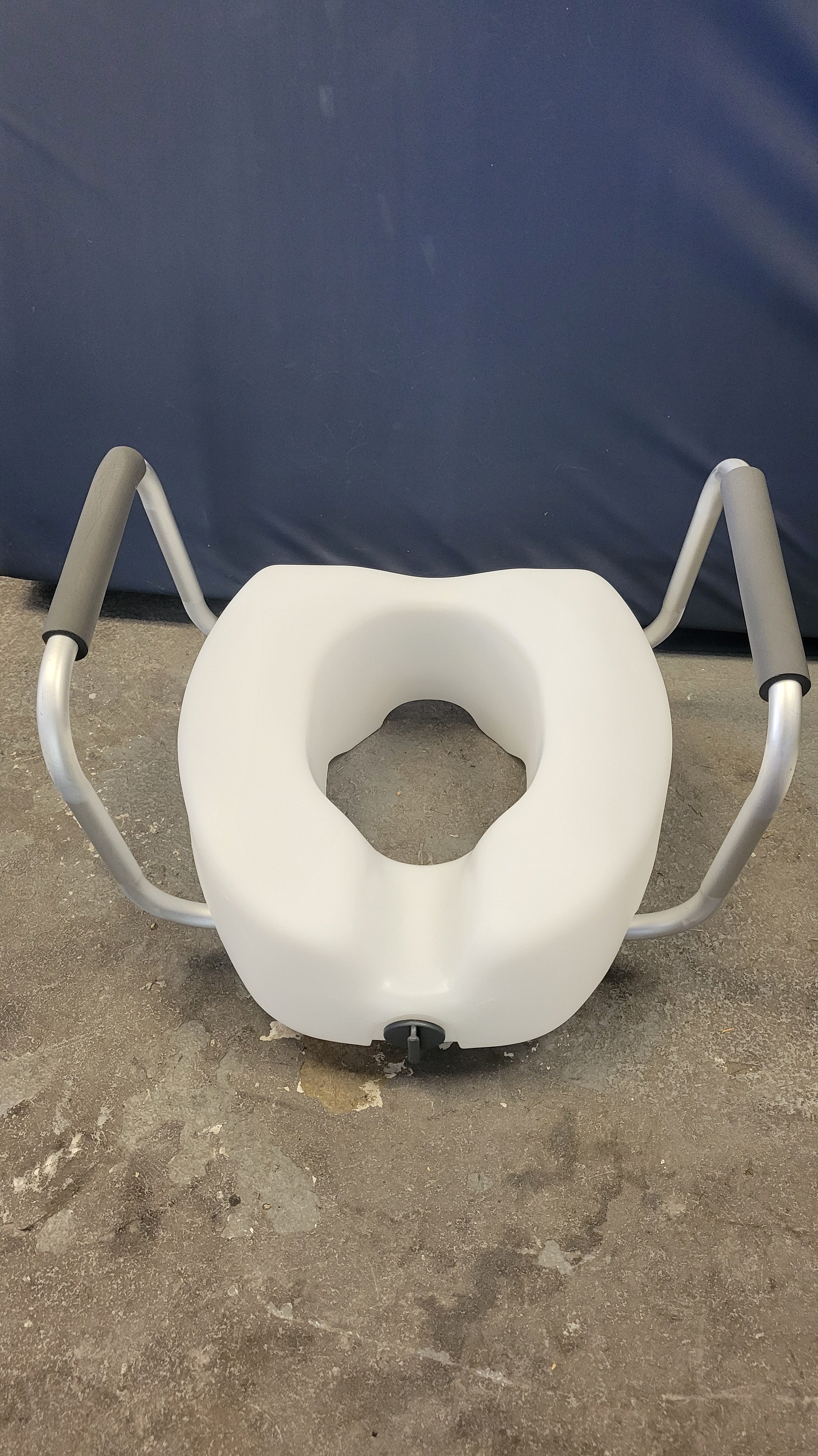 Invacare Raised Toilet Seat with arms, locking front clamp, 6 inch height